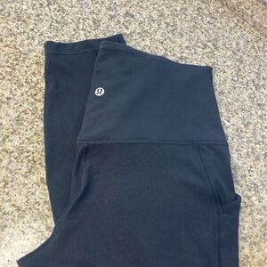 Lululemon black leggings with pockets. Size 10